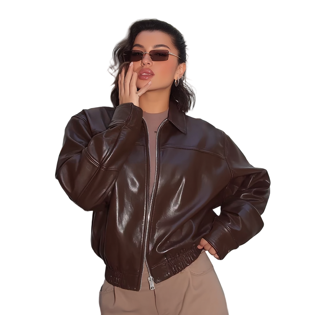 Woman wearing a brown leather jacket on a white background