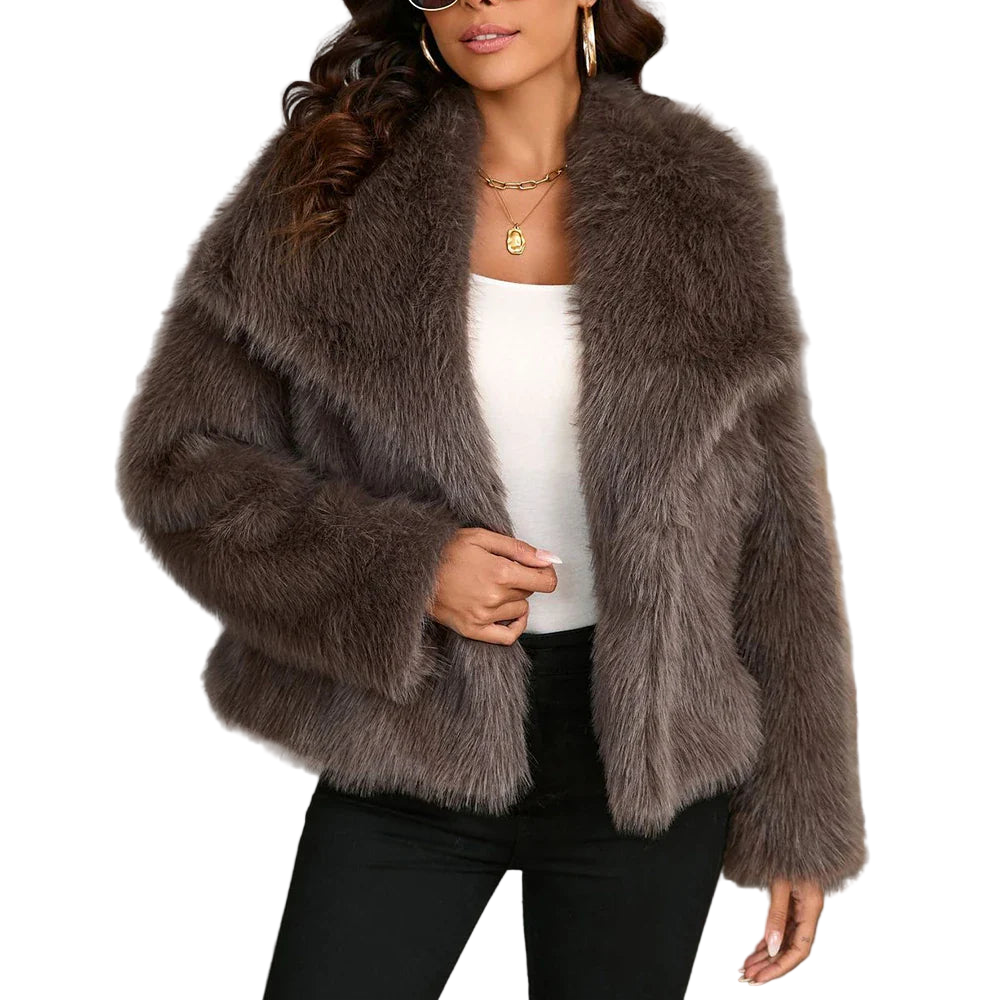 Woman wearing a brown faux fur jacket on a white background